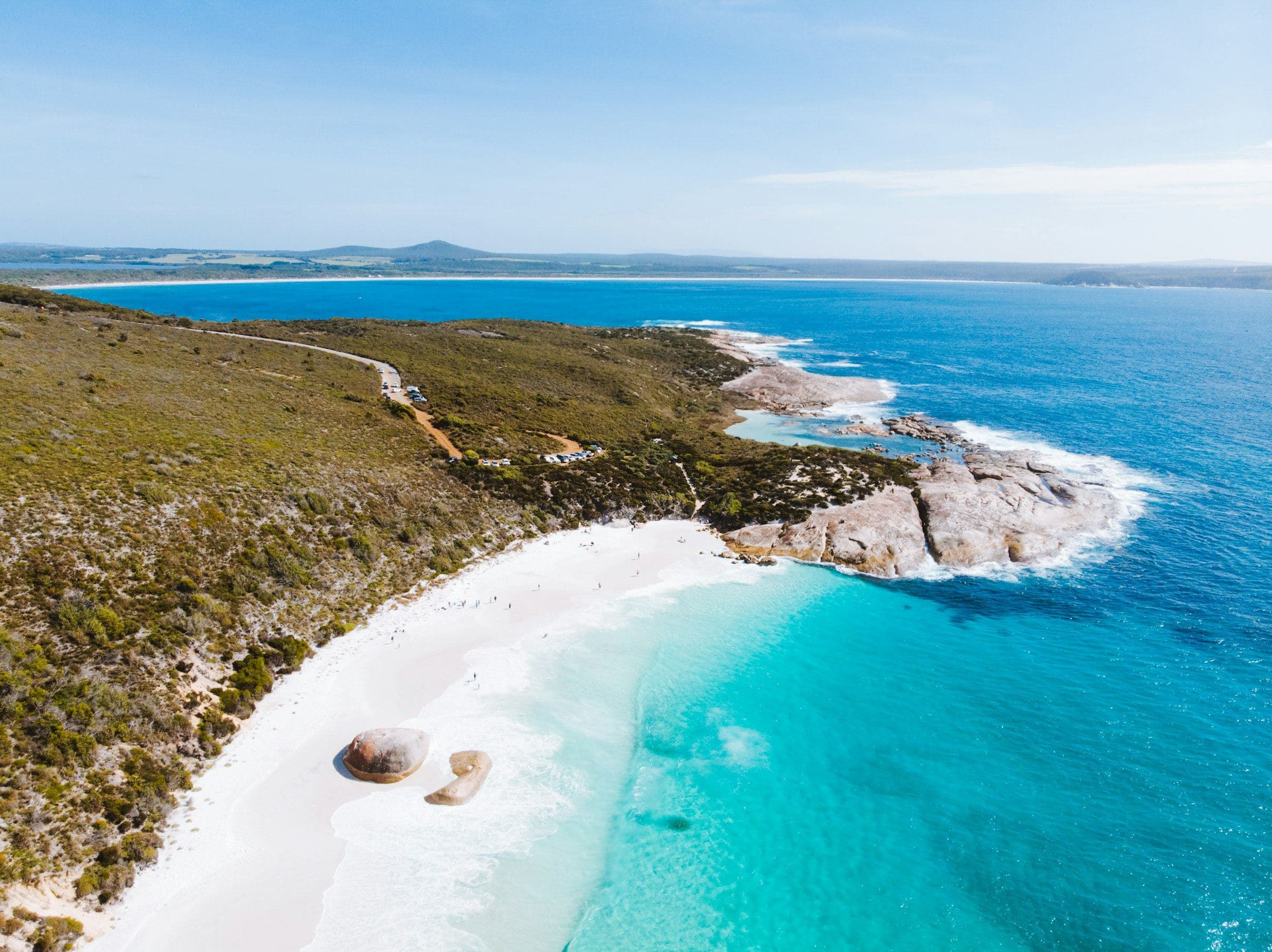 A white sand cove and turquoise water on the Western Australian coast, from above